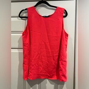 Sleeveless red top with back detail by Amanda Uprichard